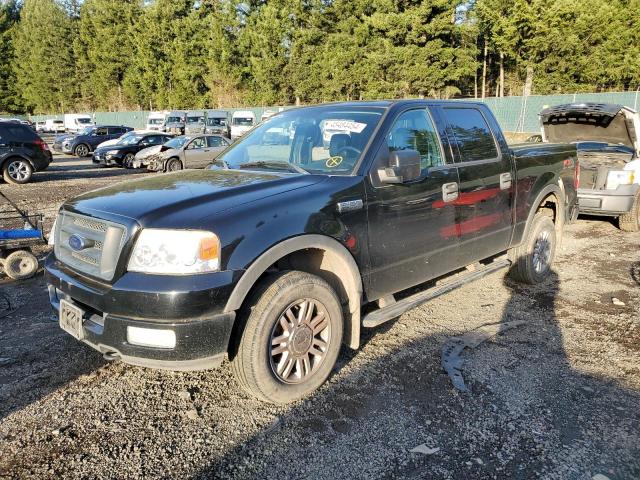 1FTPW14564KC09956 - 2004 FORD F150 SUPERCREW BLACK photo 1