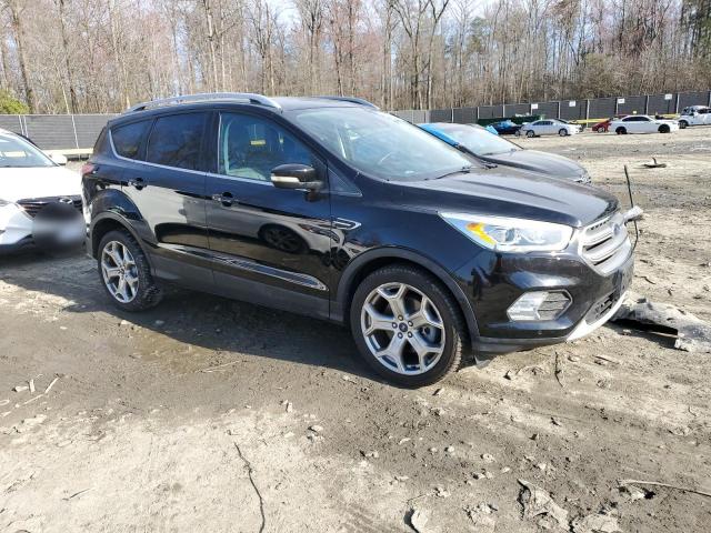 1FMCU0J98HUA61725 - 2017 FORD ESCAPE TITANIUM BLACK photo 4