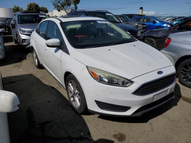 1FADP3F22FL207557 - 2015 FORD FOCUS SE WHITE photo 4