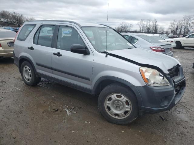 JHLRD78505C001307 - 2005 HONDA CR-V LX SILVER photo 4