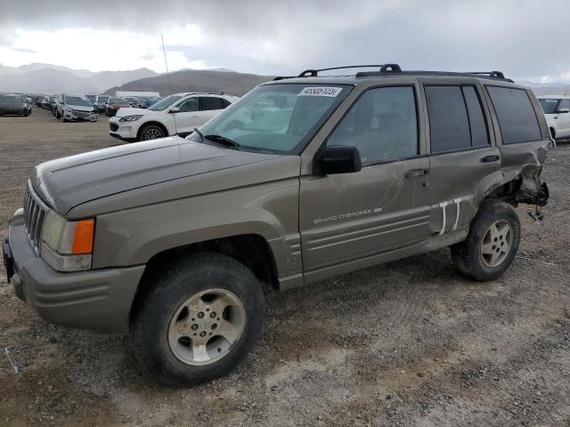 1J4GZ48Y0WC329515 - 1998 JEEP GRND CHERO LAREDO TAN photo 1