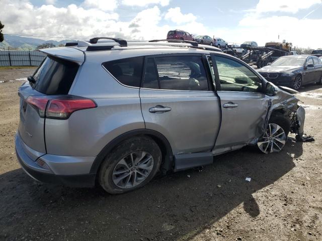 JTMRJREV4JD230700 - 2018 TOYOTA RAV4 HV LE SILVER photo 3