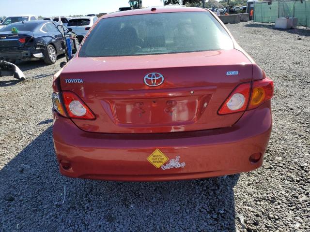 1NXBU40E19Z041075 - 2009 TOYOTA COROLLA BASE RED photo 6