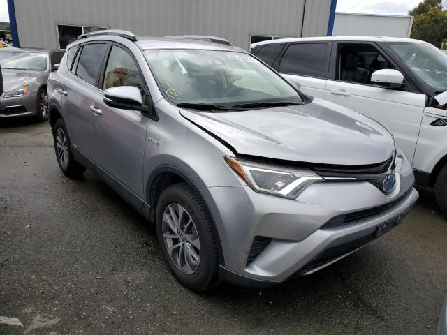 JTMRJREV3JD235743 - 2018 TOYOTA RAV4 HV LE SILVER photo 4