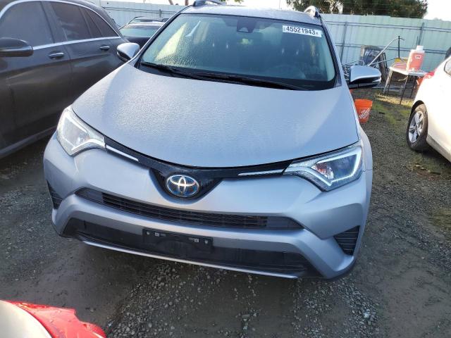 JTMRJREV3JD235743 - 2018 TOYOTA RAV4 HV LE SILVER photo 5