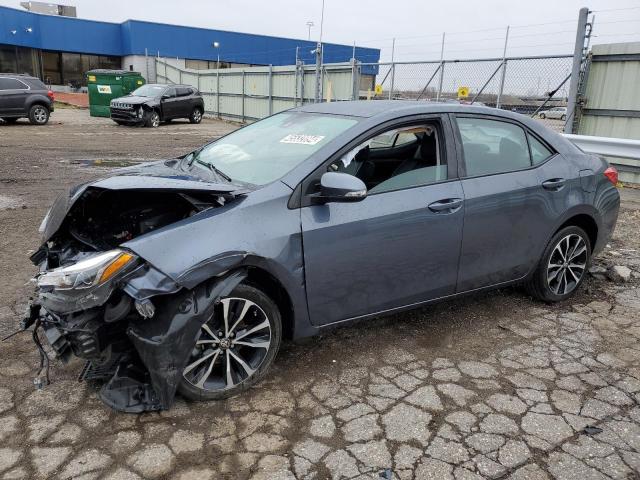 5YFBURHE7HP703565 - 2017 TOYOTA COROLLA L GRAY photo 1