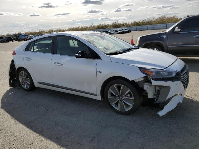 KMHC05LC4KU129883 - 2019 HYUNDAI IONIQ LIMITED WHITE photo 4