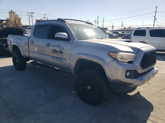 3TMDZ5BN9HM024366 - 2017 TOYOTA TACOMA DOUBLE CAB SILVER photo 4