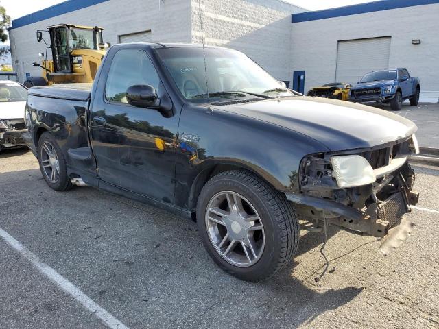 2FTZF07392CA35492 - 2002 FORD F150 SVT LIGHTNING BLACK photo 4