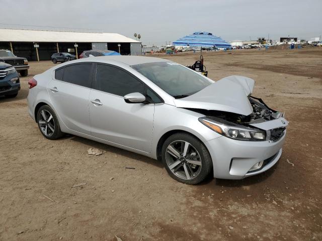 3KPFL4A85HE089743 - 2017 KIA FORTE EX SILVER photo 4