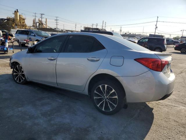 5YFBURHE5HP597049 - 2017 TOYOTA COROLLA L SILVER photo 2