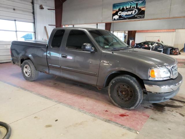 2FTRX17W83CA96945 - 2003 FORD F150 GRAY photo 4