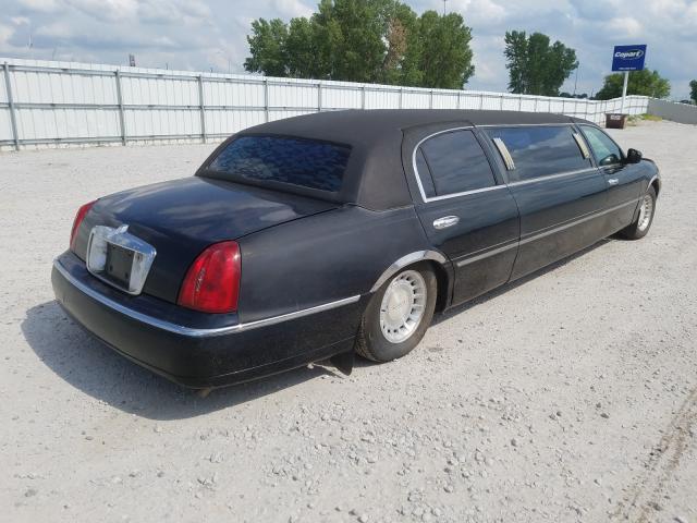 1L1FM81W4XY642939 - 1999 LINCOLN TOWN CAR EXECUTIVE BLACK photo 4