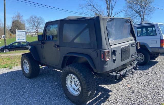 1J4AA2D11BL630380 - 2011 JEEP WRANGLER SPORT BLACK photo 4