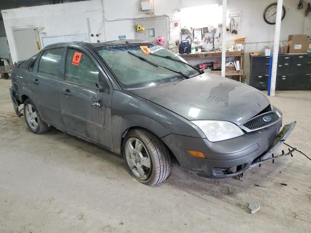 1FAFP34N07W139376 - 2007 FORD FOCUS ZX4 GRAY photo 4