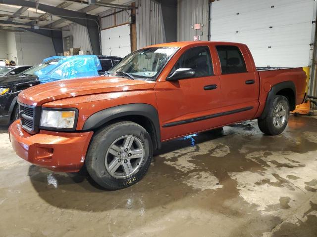 1D7HW58N48S602405 - 2008 DODGE DAKOTA QUAD LARAMIE ORANGE photo 1