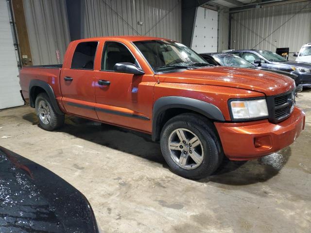 1D7HW58N48S602405 - 2008 DODGE DAKOTA QUAD LARAMIE ORANGE photo 4