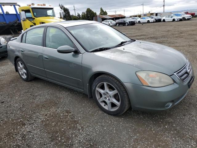 1N4BL11D32C120678 - 2002 NISSAN ALTIMA SE TURQUOISE photo 4