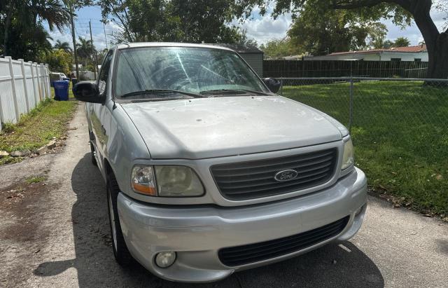 2FTRF07384CA39553 - 2004 FORD F150 SVT LIGHTNING SILVER photo 1