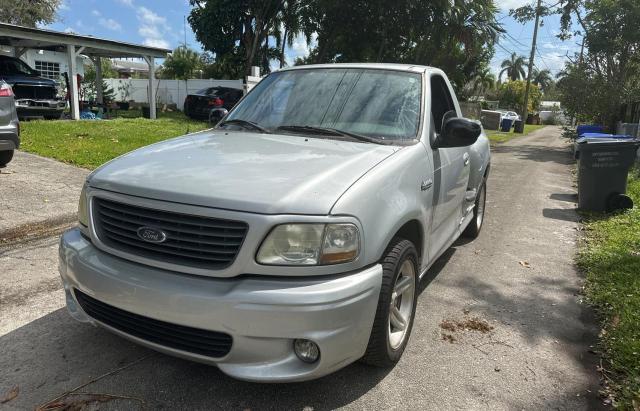 2FTRF07384CA39553 - 2004 FORD F150 SVT LIGHTNING SILVER photo 2