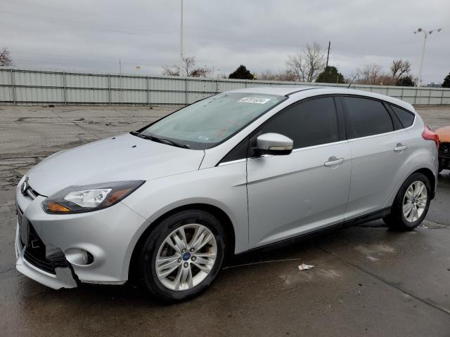 1FAHP3M24CL174674 - 2012 FORD FOCUS SEL SILVER photo 1