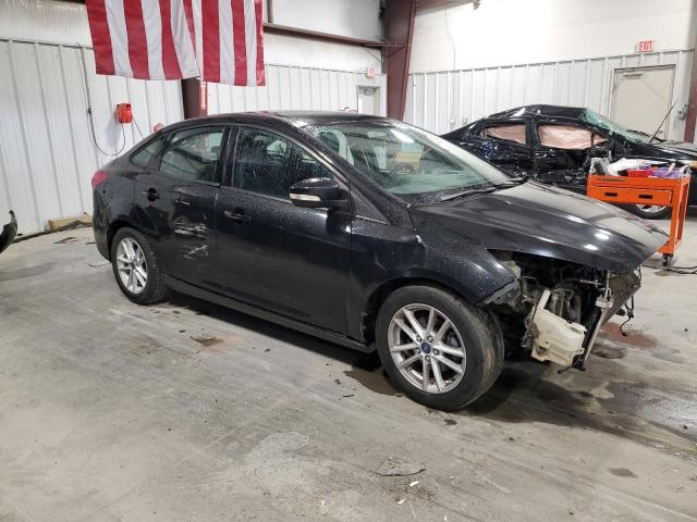 1FADP3F2XFL322214 - 2015 FORD FOCUS SE BLACK photo 4