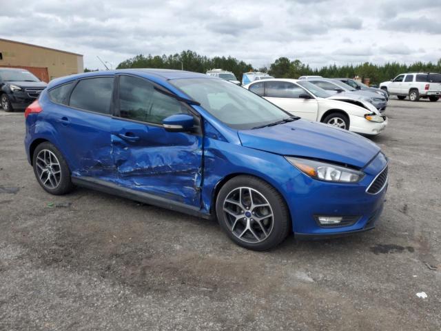 1FADP3M24JL271580 - 2018 FORD FOCUS SEL BLUE photo 4