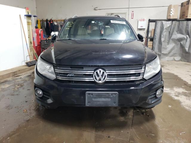 WVGBV7AXXGW044010 - 2016 VOLKSWAGEN TIGUAN S BLACK photo 5