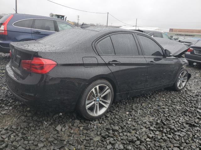 WBA8D9G5XHNT91117 - 2017 BMW 330 XI BLACK photo 3