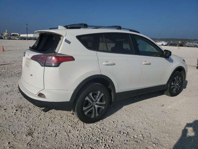 JTMZFREV1HJ115209 - 2017 TOYOTA RAV4 LE WHITE photo 3