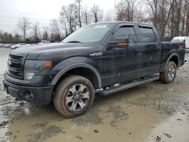 1FTFW1EF8EFB05143 - 2014 FORD F150 SUPERCREW BLACK photo 1