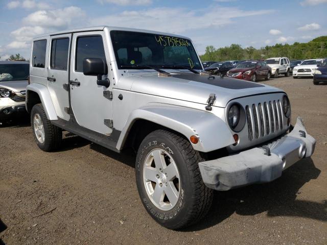 1J4BA5H11BL576806 - 2011 JEEP WRANGLER U SAHARA SILVER photo 1
