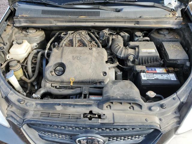 KNAFG526197252877 - 2009 KIA RONDO LX BROWN photo 11