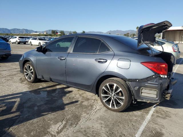 5YFBURHE7KP905068 - 2019 TOYOTA COROLLA L BLUE photo 2