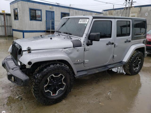 1C4HJWEG2GL267867 - 2016 JEEP WRANGLER U SAHARA SILVER photo 1