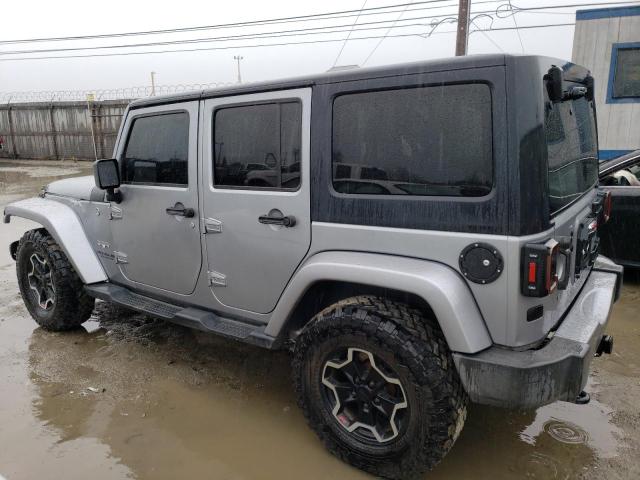 1C4HJWEG2GL267867 - 2016 JEEP WRANGLER U SAHARA SILVER photo 2