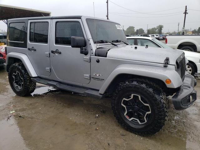 1C4HJWEG2GL267867 - 2016 JEEP WRANGLER U SAHARA SILVER photo 4
