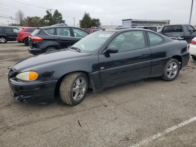 1G2NV12E53C320377 - 2003 PONTIAC GRAND AM GT1 BLACK photo 1