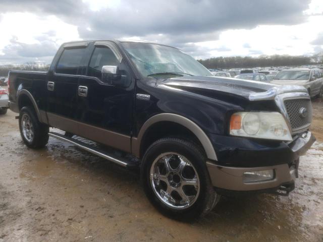 1FTPW14595KE70306 - 2005 FORD F150 SUPERCREW BLACK photo 4