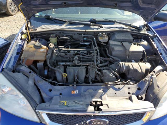 1FAFP34NX6W103550 - 2006 FORD FOCUS ZX4 BLUE photo 11