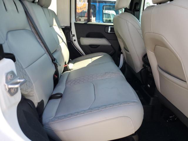 1C4JJXP63NW220628 - 2022 JEEP WRANGLER U SAHARA 4XE WHITE photo 11