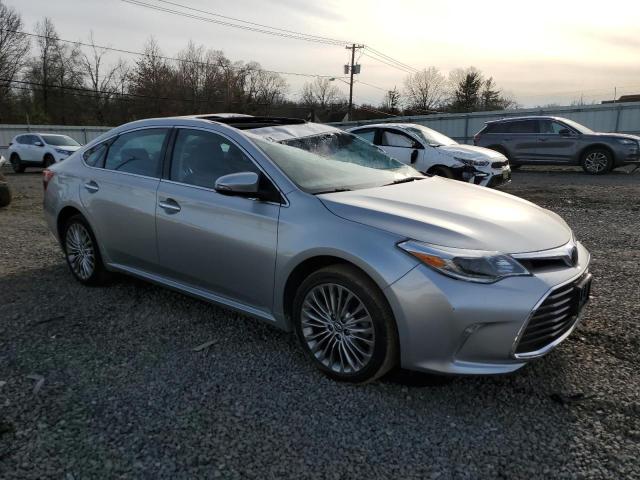 4T1BK1EB0JU281175 - 2018 TOYOTA AVALON XLE SILVER photo 4