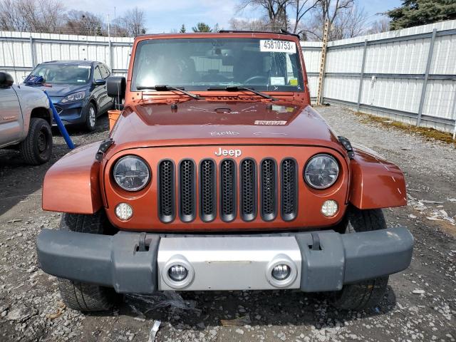 1C4HJWEG1EL165733 - 2014 JEEP WRANGLER U SAHARA ORANGE photo 5