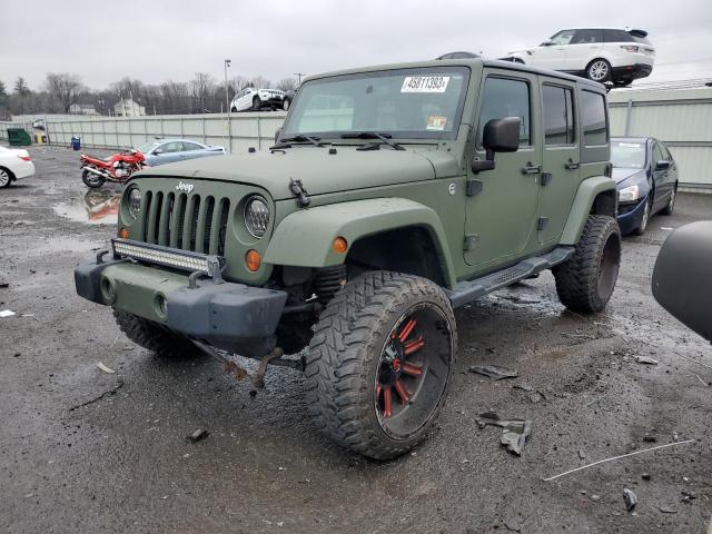 1C4BJWEG5DL699774 - 2013 JEEP WRANGLER U SAHARA GREEN photo 1