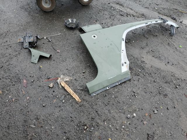 1C4BJWEG5DL699774 - 2013 JEEP WRANGLER U SAHARA GREEN photo 12