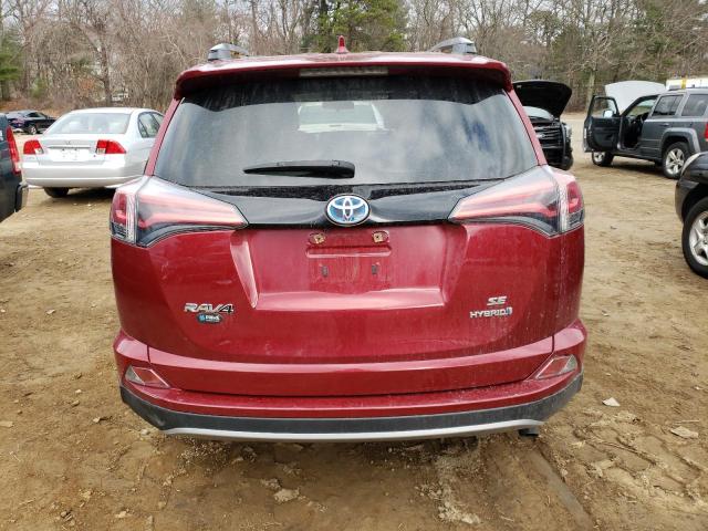 JTMJJREV9JD242502 - 2018 TOYOTA RAV4 HV SE RED photo 6