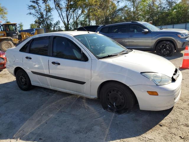 1FAFP33P82W146569 - 2002 FORD FOCUS LX WHITE photo 4