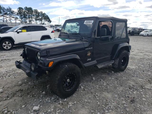 1J4FA59S62P761807 - 2002 JEEP WRANGLER / SAHARA BLACK photo 1