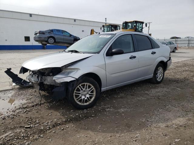 1FAHP34NX7W188299 - 2007 FORD FOCUS ZX4 SILVER photo 1