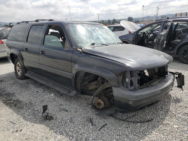 3GNEC16T61G224429 - 2001 CHEVROLET SUBURBAN C1500 BLACK photo 4